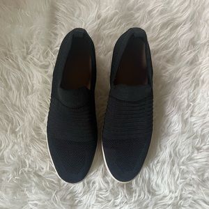 Black slip-on platform shoes